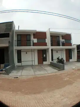 Rumah cantik balkon dan mezzanin harga 400jtan deket stasiun depok