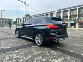 BMW X1 XDRIVE 18i BENSIN AT 2018 (BSI ACTIVE UNTIL 2028)