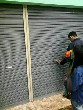 Tukang spesialis service rolling door folding gate murah