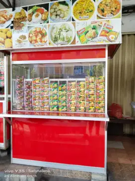 Menjaga warung indomie dan kost putri