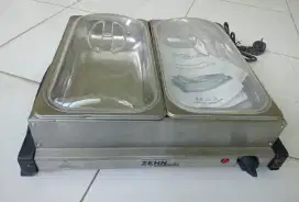 Penghangat makanan + tutup. Ada 2 buah