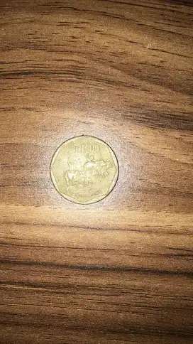Koin kuno 100 perak kuning Karupan Sapi
