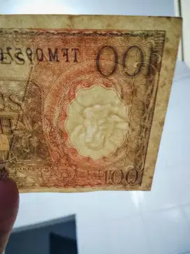 Uang 100 seri pekerja 1964