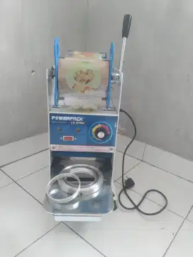 Alat penyegel gelas plastik