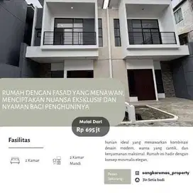 Rumah dengan fasad yang menawan, menciptakan nuansa eksklusif dan nyam