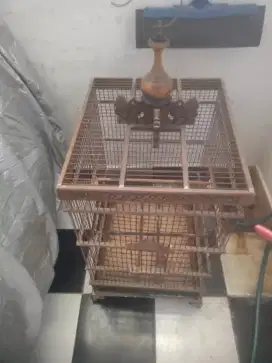 Kandang burung jati ukir