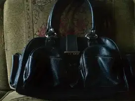 Tas selempang kulit untuk wanita