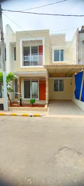 Dijual Rumah 2 Lt minimalis  dalam cluster srategis di  Cinere Depok .