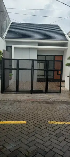 Rumah murah 1.5 lantai perumahan Wiguna DP nol