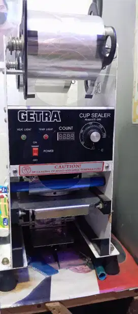 Mesin press cup sealler Getra