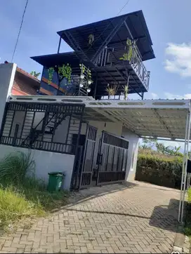 Rumah siap huni dikota batu