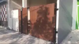 pagar rumah geser bahan conwood murah berkualitas