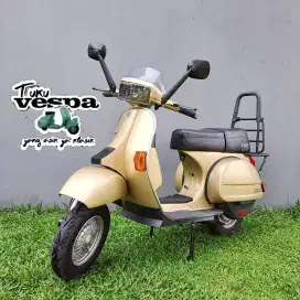 Vespa excel coklat metalik