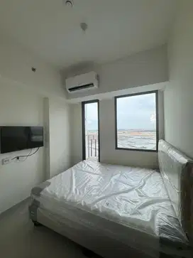 Disewakan apartemen osaka riverview pik2 studio furnish 11jt/thn