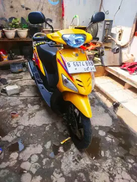 Mio sporty kuning hitam merah biru
