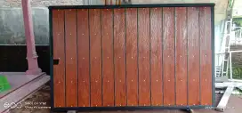 Pintu minimalis kombinasi lisplang