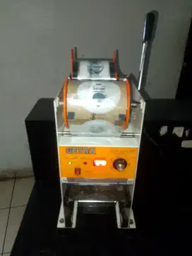 Mesin cup Sealer Getra fungsi normal