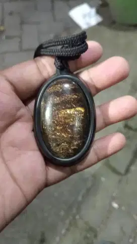 Liontin Naga sikoi