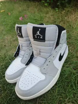 Nike air jordan 1 mid light smoke grey.