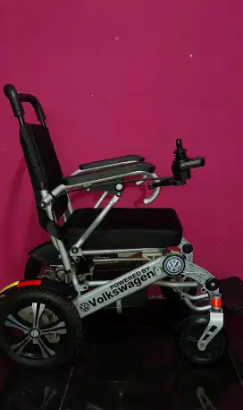 Kursi roda listrik elektrik