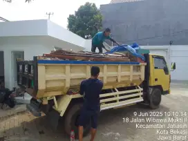 Buang puing sampah