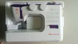 Mesin jahit listrik portebel merek Riccar