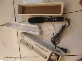 sisir elektrik , catokan