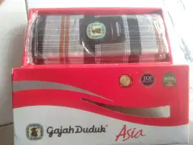 Sarung cap gajah duduk