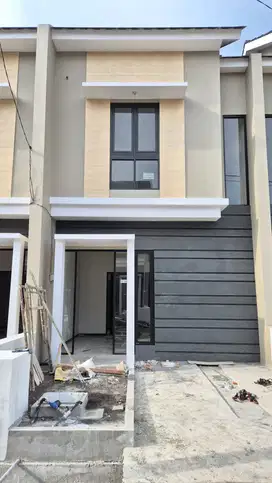 Rumah 2 Lantai Gununganyar Sby di Jalan Raya OERR 700 Jutaan Murah SHM