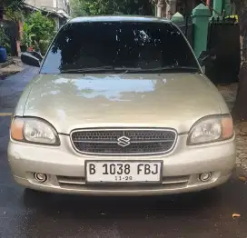 Bodi ngaleng suzuki baleno sedan manual tahun 2000 warna coklat