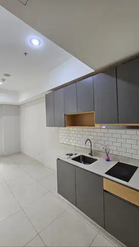 disewakan 2 bedroom semi furnish taman anggrek residence