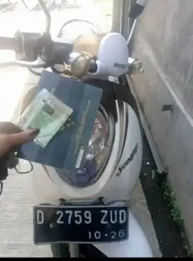 Motor scoopy karbu 2011