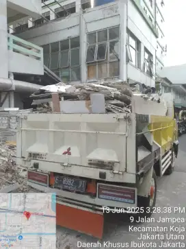 Jasa buang puing dan tanah