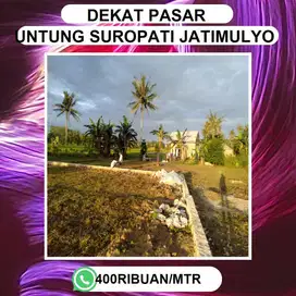 TANAH DEKAT PASAR UNTUNG DAN JATIMULYO NEMPEL JALAN UTAMA