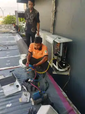 SERVICE AC BONGKAR PASANG AC