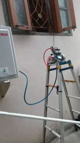 Jasa servis AC kulkas frezer showcase mesin cuci dan bongkar pasang AC
