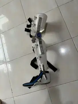 Deker Penyangga lutut pergelangan kaki pasca operasi