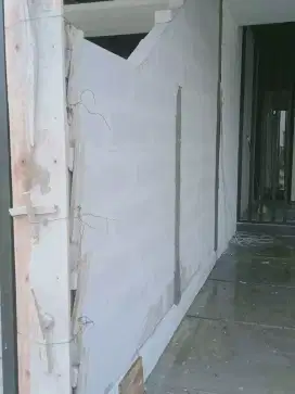 Tukang acian bata ringan