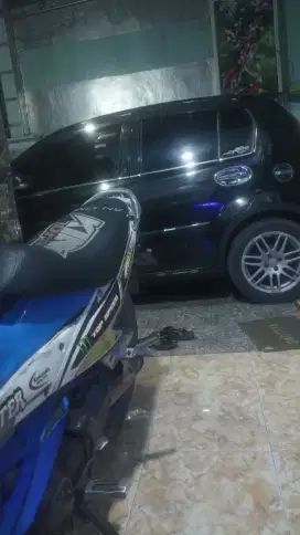 Daihatsu sirion tahun 2012 warna hitam metalik