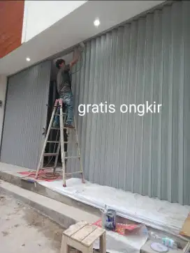 Rolling door folding gate