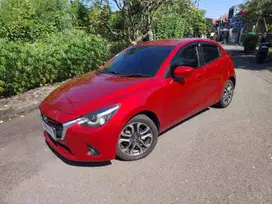 DP MURAH Mazda 2 1.5 Skyactiv Bensin-MT 2014 MERAH EOG