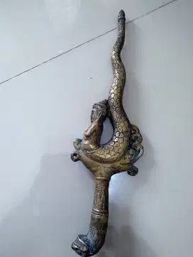 pusaka naga kepala dewa