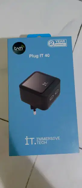 Adapter / Charger merk IT. Baru. Garansi TAM 2 thn. 2 colokan type C.