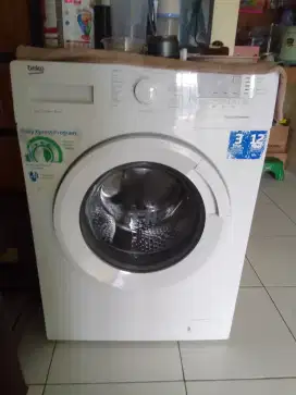 Mesin cuci dan pengering