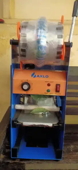 Mesin Sealer merk AXLO