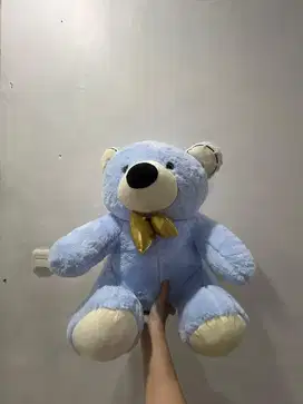 Boneka Beruang biru pita