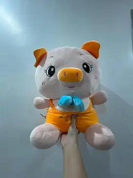 Boneka babi peach kuning pita
