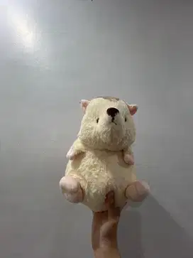 Boneka warna cream abu