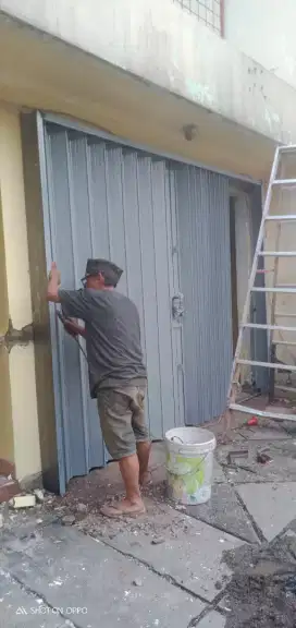 Rolling door baru folding gate besi