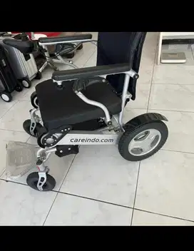 Kursi roda elektrik